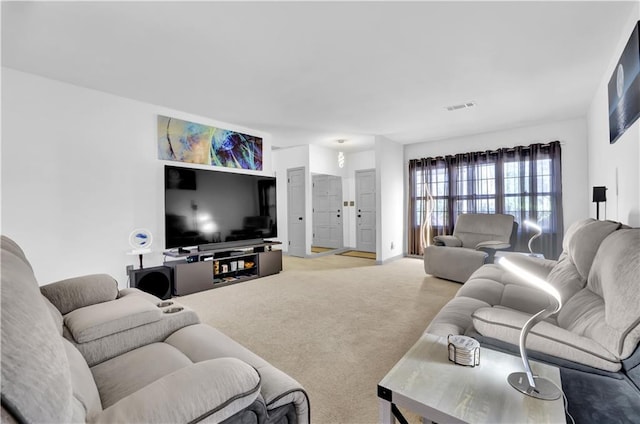 carpeted living room with visible vents