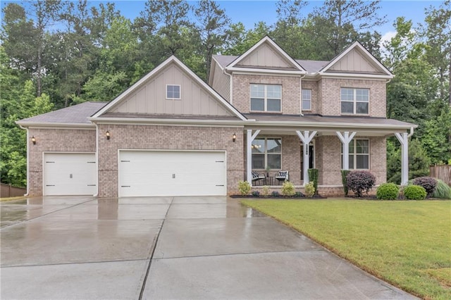 6179 Ashbranch Dr, Acworth, GA 30101 - craftsman-style home featuring covered porch, board and batten siding, concrete driveway, a front lawn, and an attached garage