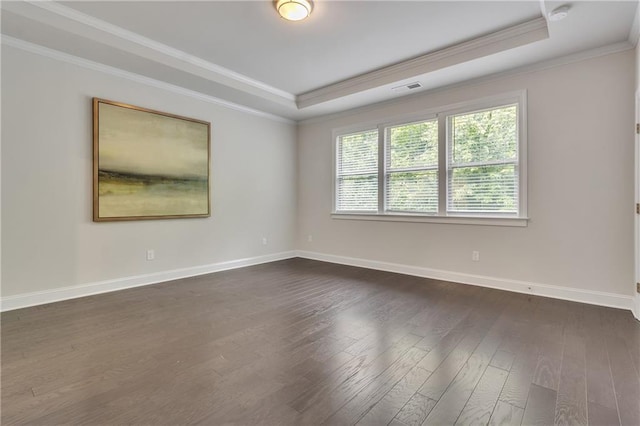 6179 Ashbranch Dr, Acworth, GA 30101 - empty room featuring a tray ceiling, crown molding, dark wood finished floors, baseboards, and a smoke detector