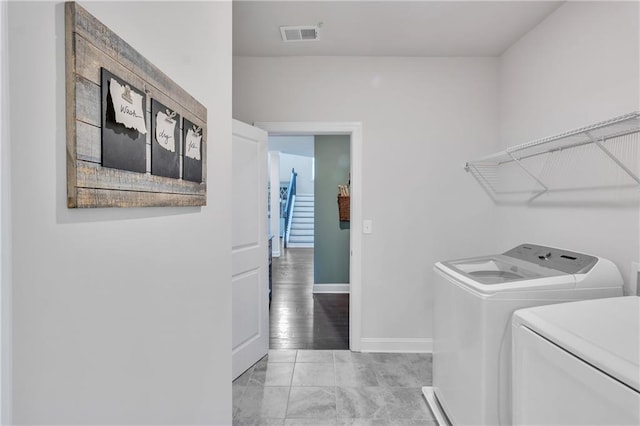 6179 Ashbranch Dr, Acworth, GA 30101 - washroom with washing machine and dryer and baseboards