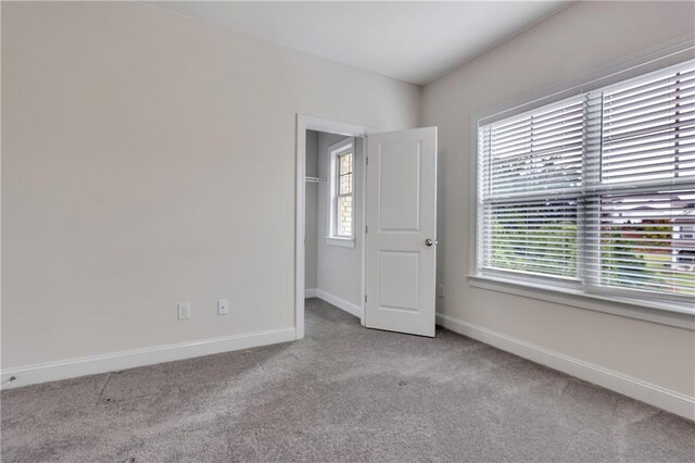 6179 Ashbranch Dr, Acworth, GA 30101 - carpeted empty room featuring baseboards