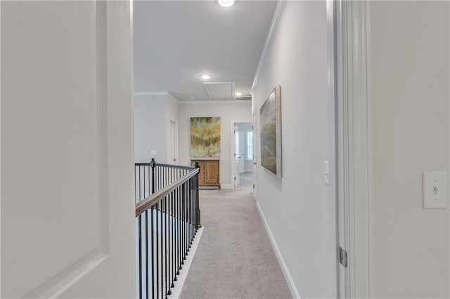 6179 Ashbranch Dr, Acworth, GA 30101 - corridor with attic access, crown molding, light colored carpet, baseboards, and recessed lighting