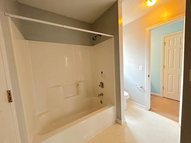 full bathroom featuring toilet, shower / bathtub combination, and baseboards