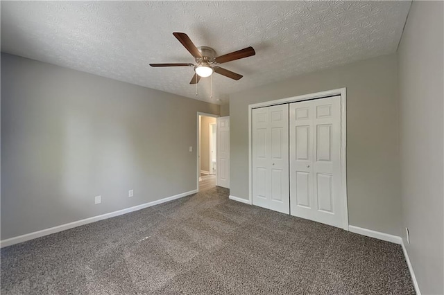 1011 Darvin Ln NW, Kennesaw, GA 30144 - unfurnished bedroom with carpet floors, a closet, a textured ceiling, and ceiling fan
