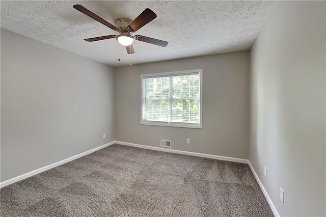 1011 Darvin Ln NW, Kennesaw, GA 30144 - carpeted spare room with a textured ceiling and a ceiling fan