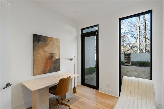 office space featuring light hardwood / wood-style floors