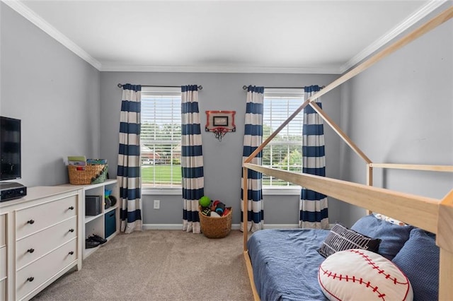 carpeted bedroom with multiple windows, baseboards, and ornamental molding