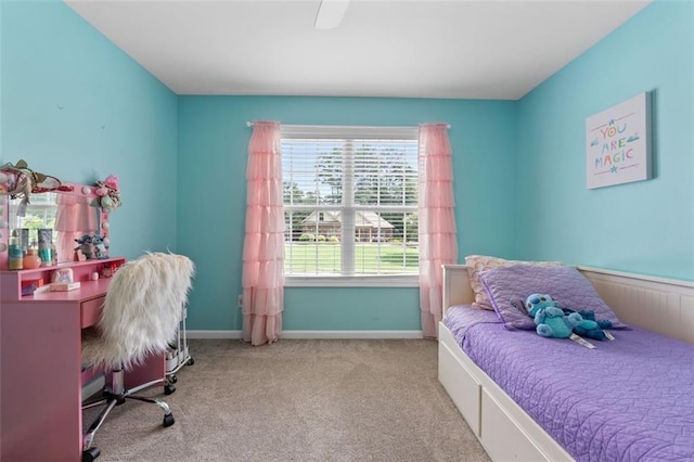 carpeted bedroom with ceiling fan