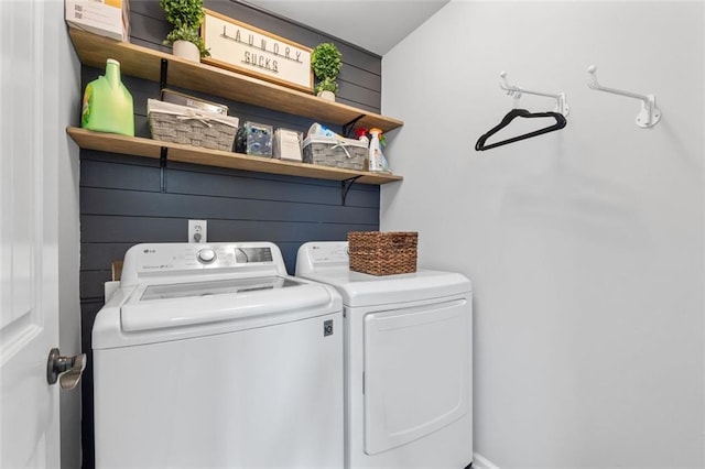 laundry room featuring washer and clothes dryer and laundry area