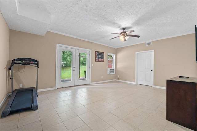 workout area with a ceiling fan, crown molding, a textured ceiling, baseboards, and visible vents