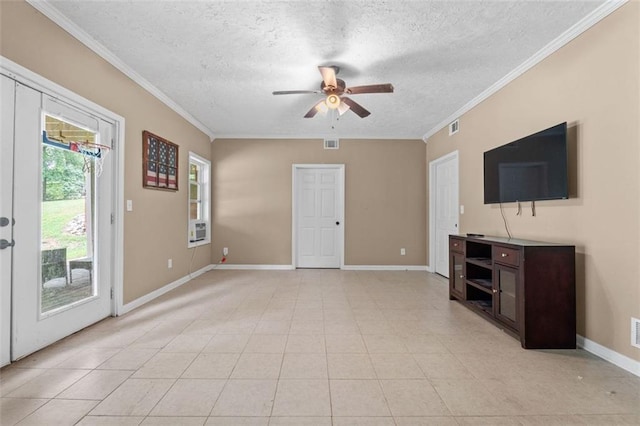 unfurnished living room featuring a ceiling fan, a textured ceiling, baseboards, ornamental molding, and visible vents