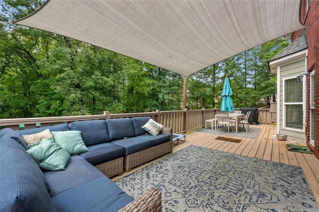 wooden deck with outdoor lounge area and outdoor dining space