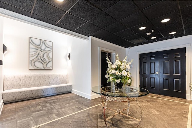 entryway with crown molding