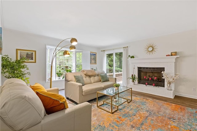 1995 Raleigh Tavern Dr, Roswell, GA 30076 - living room with wood finished floors, baseboards, and a fireplace