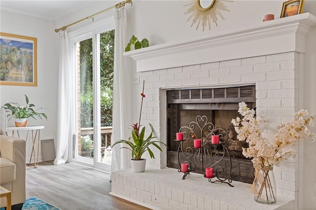 1995 Raleigh Tavern Dr, Roswell, GA 30076 - detailed view of a brick fireplace, wood finished floors, and crown molding