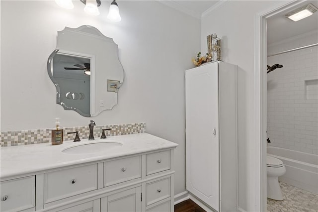 1995 Raleigh Tavern Dr, Roswell, GA 30076 - full bath with toilet, crown molding, ceiling fan, vanity, and backsplash
