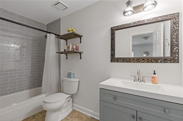 1995 Raleigh Tavern Dr, Roswell, GA 30076 - full bathroom featuring toilet, vanity, shower / tub combo with curtain, tile patterned floors, and baseboards