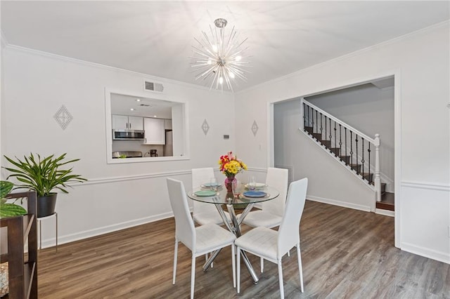 1995 Raleigh Tavern Dr, Roswell, GA 30076 - dining space featuring a chandelier, stairway, ornamental molding, wood finished floors, and baseboards