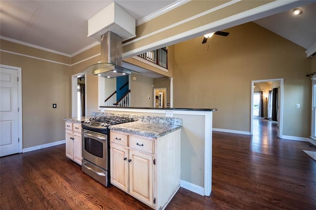 kitchen featuring stainless steel range with gas cooktop, dark hardwood / wood-style floors, light stone countertops, island range hood, and crown molding