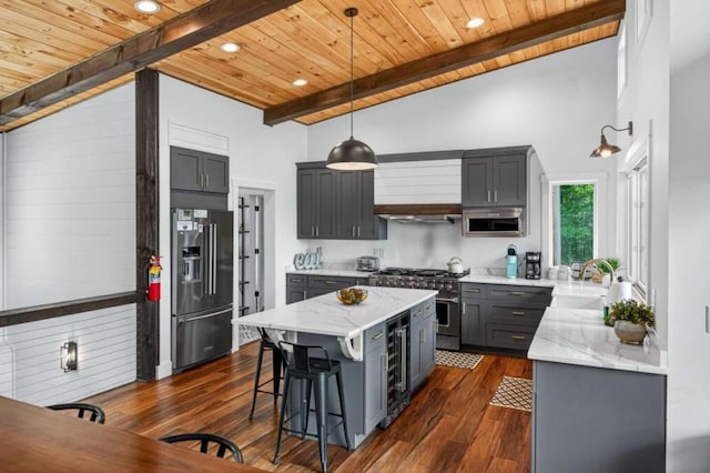 897 Faraday Dr, Ellijay, GA 30540 - kitchen with high quality appliances, wood ceiling, beverage cooler, custom exhaust hood, and light stone counters