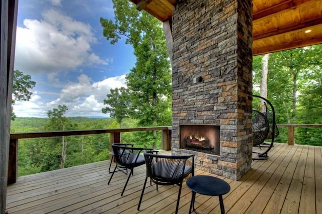 897 Faraday Dr, Ellijay, GA 30540 - deck featuring an outdoor stone fireplace