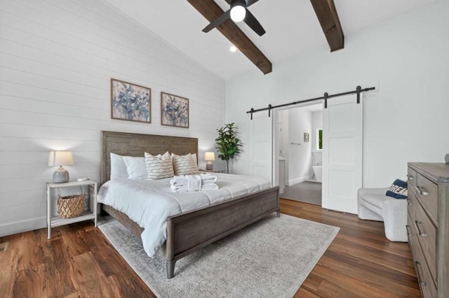 897 Faraday Dr, Ellijay, GA 30540 - bedroom featuring a barn door, beamed ceiling, dark wood-style floors, ensuite bathroom, and ceiling fan