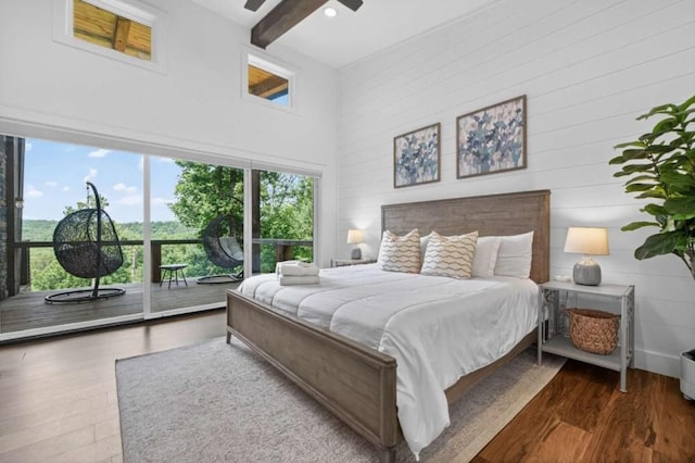 897 Faraday Dr, Ellijay, GA 30540 - bedroom with access to outside, a towering ceiling, wood finished floors, ceiling fan, and beamed ceiling