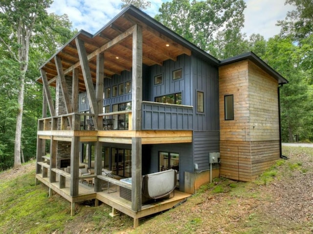 897 Faraday Dr, Ellijay, GA 30540 - back of property with board and batten siding and a wooden deck