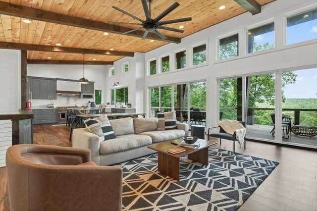 897 Faraday Dr, Ellijay, GA 30540 - living area featuring a wooden ceiling with exposed beams, healthy amount of natural light, dark wood finished floors, a ceiling fan, and recessed lighting