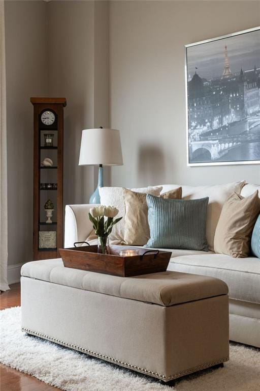 living room with wood finished floors and baseboards