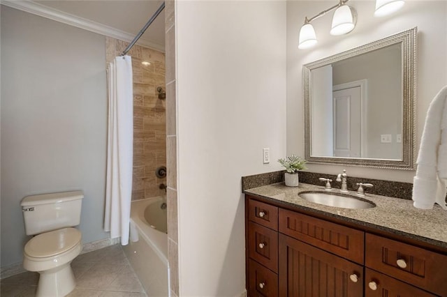 bathroom with baseboards, crown molding, tile patterned flooring, toilet, and vanity