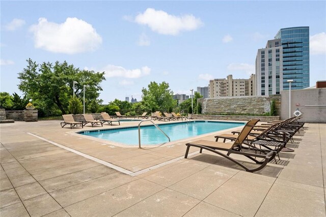 community pool featuring a patio