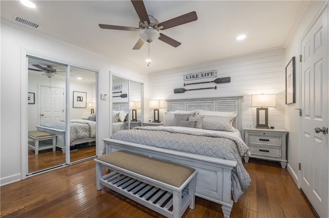 4442 Academy St, Acworth, GA 30101 - bedroom with multiple closets, crown molding, hardwood / wood-style flooring, a ceiling fan, and recessed lighting