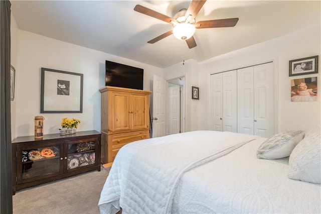 4442 Academy St, Acworth, GA 30101 - bedroom with light colored carpet, a closet, and a ceiling fan