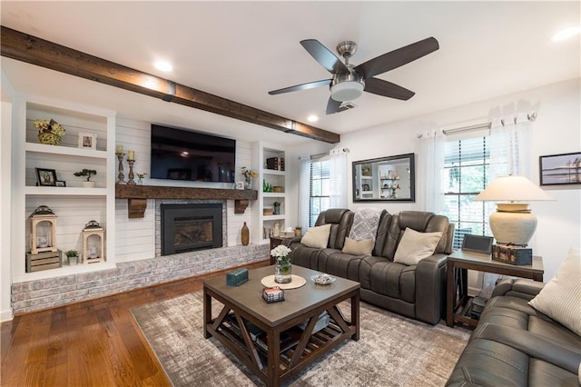 4442 Academy St, Acworth, GA 30101 - living room with beam ceiling, wood finished floors, a brick fireplace, a ceiling fan, and recessed lighting