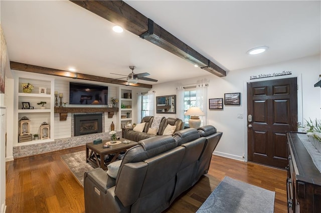 4442 Academy St, Acworth, GA 30101 - living area featuring a ceiling fan, a fireplace, beam ceiling, dark wood-style flooring, and recessed lighting