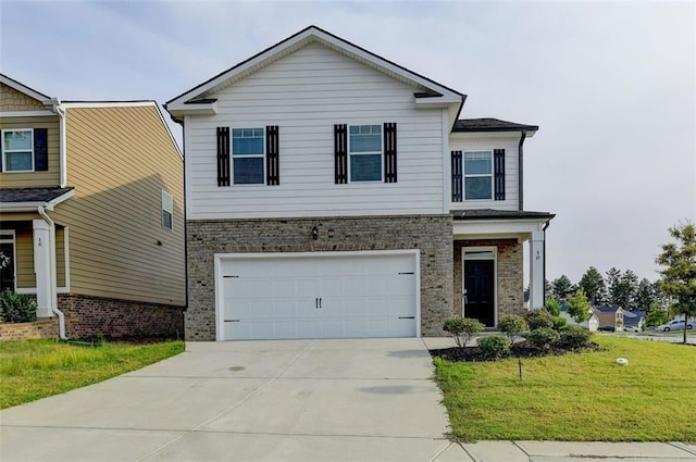 view of front of house with concrete driveway, an attached garage, brick siding, and a front yard