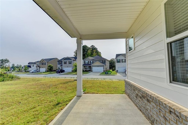 view of yard with a residential view