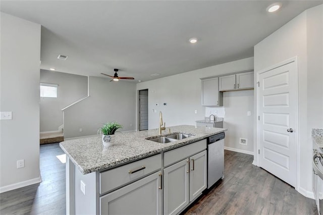 kitchen featuring a sink, dark wood-style flooring, an island with sink, and stainless steel dishwasher