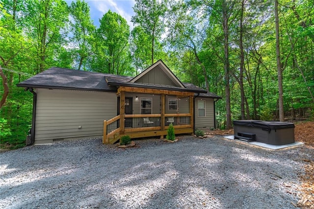 view of front of house with a hot tub