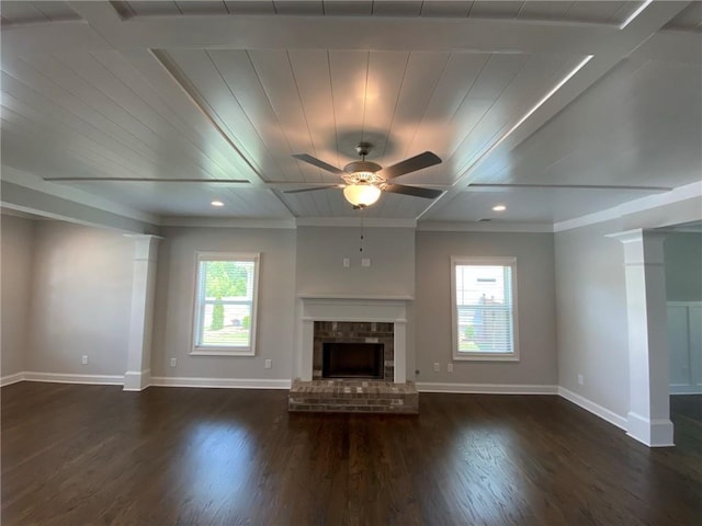 unfurnished living room with a fireplace, dark hardwood / wood-style flooring, ceiling fan, and coffered ceiling