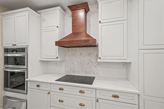 230 Bristol Stone Ct, Johns Creek, GA 30005 - kitchen with wall chimney exhaust hood, a warming drawer, stainless steel double oven, black electric cooktop, and backsplash