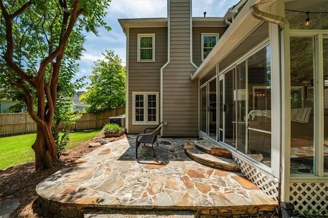 230 Bristol Stone Ct, Johns Creek, GA 30005 - view of patio with cooling unit and a sunroom