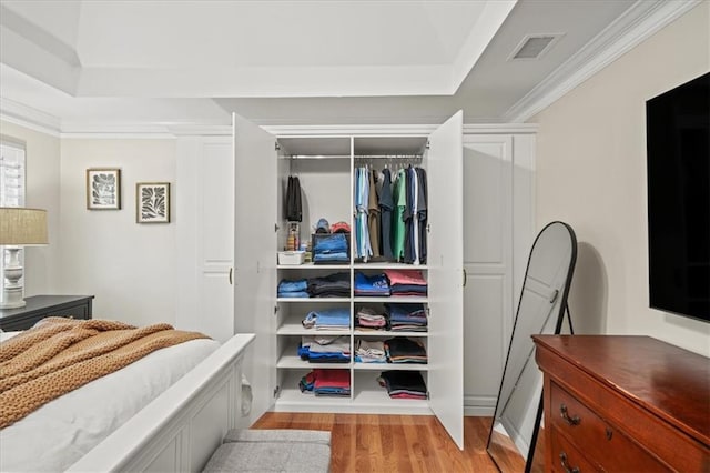 230 Bristol Stone Ct, Johns Creek, GA 30005 - bedroom featuring light wood-type flooring, ornamental molding, and a closet
