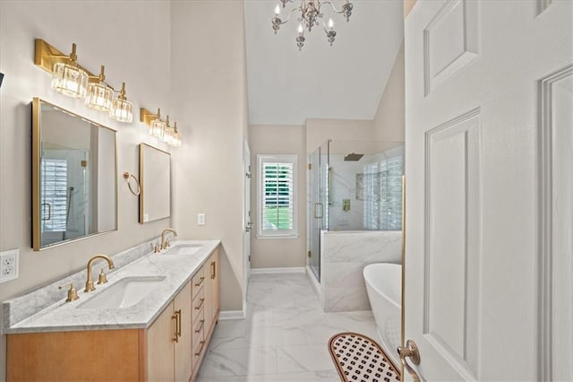 230 Bristol Stone Ct, Johns Creek, GA 30005 - bathroom with marble look tiles, baseboards, a stall shower, a freestanding tub, and a chandelier