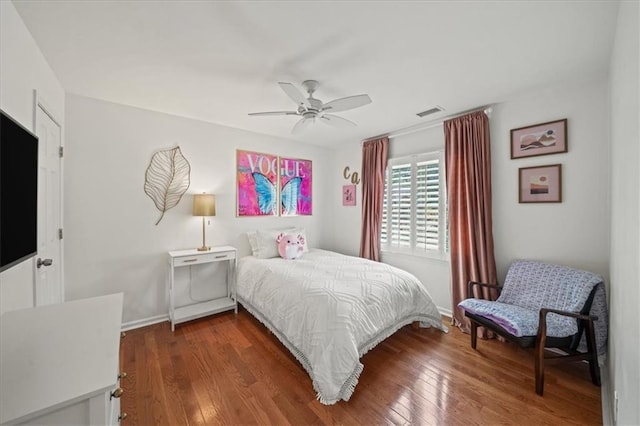 230 Bristol Stone Ct, Johns Creek, GA 30005 - bedroom with dark wood-style flooring, baseboards, and a ceiling fan
