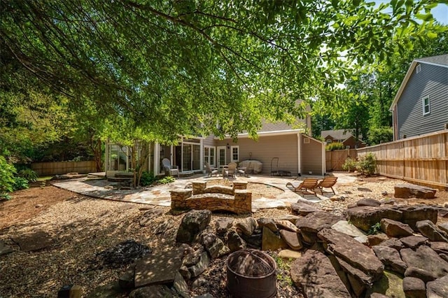 230 Bristol Stone Ct, Johns Creek, GA 30005 - fenced backyard featuring a patio area