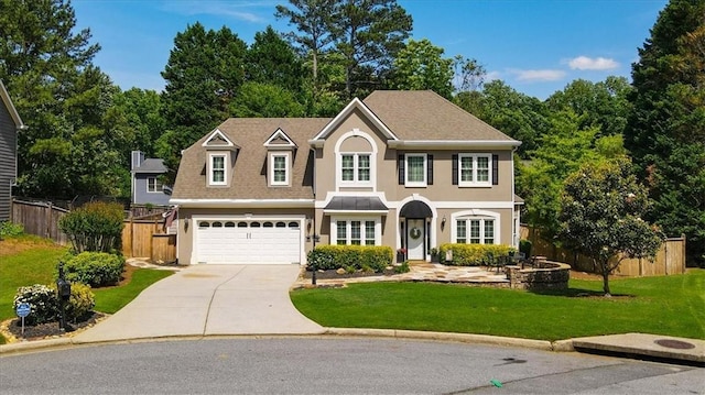 230 Bristol Stone Ct, Johns Creek, GA 30005 - view of front of home featuring stucco siding, concrete driveway, a garage, and roof with shingles