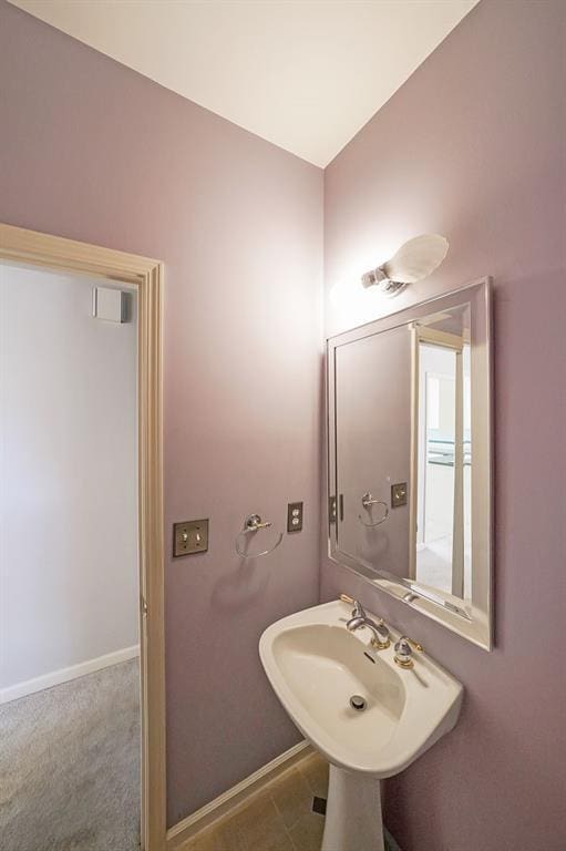 bathroom with baseboards