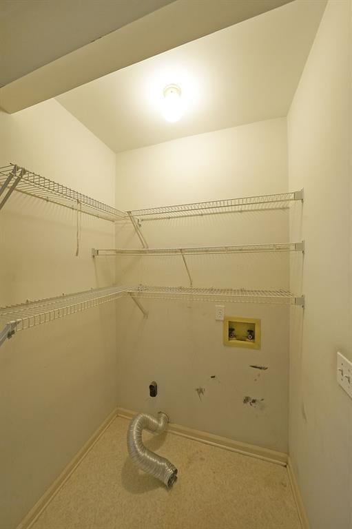 washroom with washer hookup, laundry area, hookup for an electric dryer, and baseboards